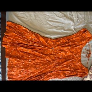 Fun tie back orange dress with button detail